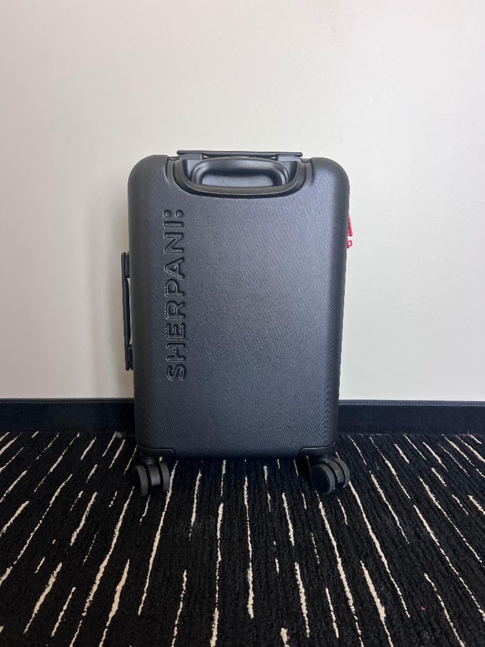Sherpani Meridian 22” Carry-On Hardside Wheeled Luggage TSA Lock